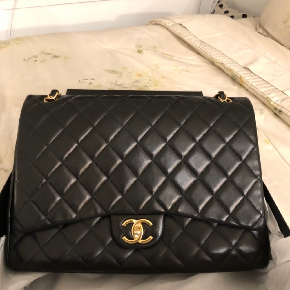 Chanel lambskin quilted  black maxi single flap bag